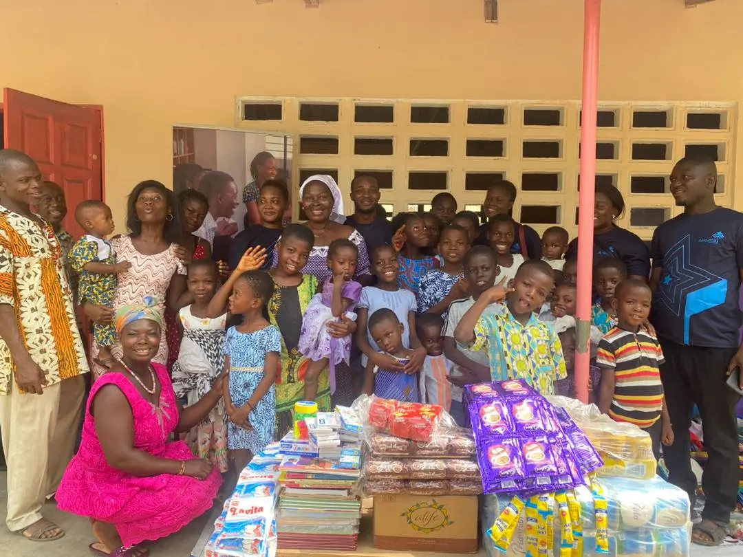 Seasonal Drive — children receiving gifts
